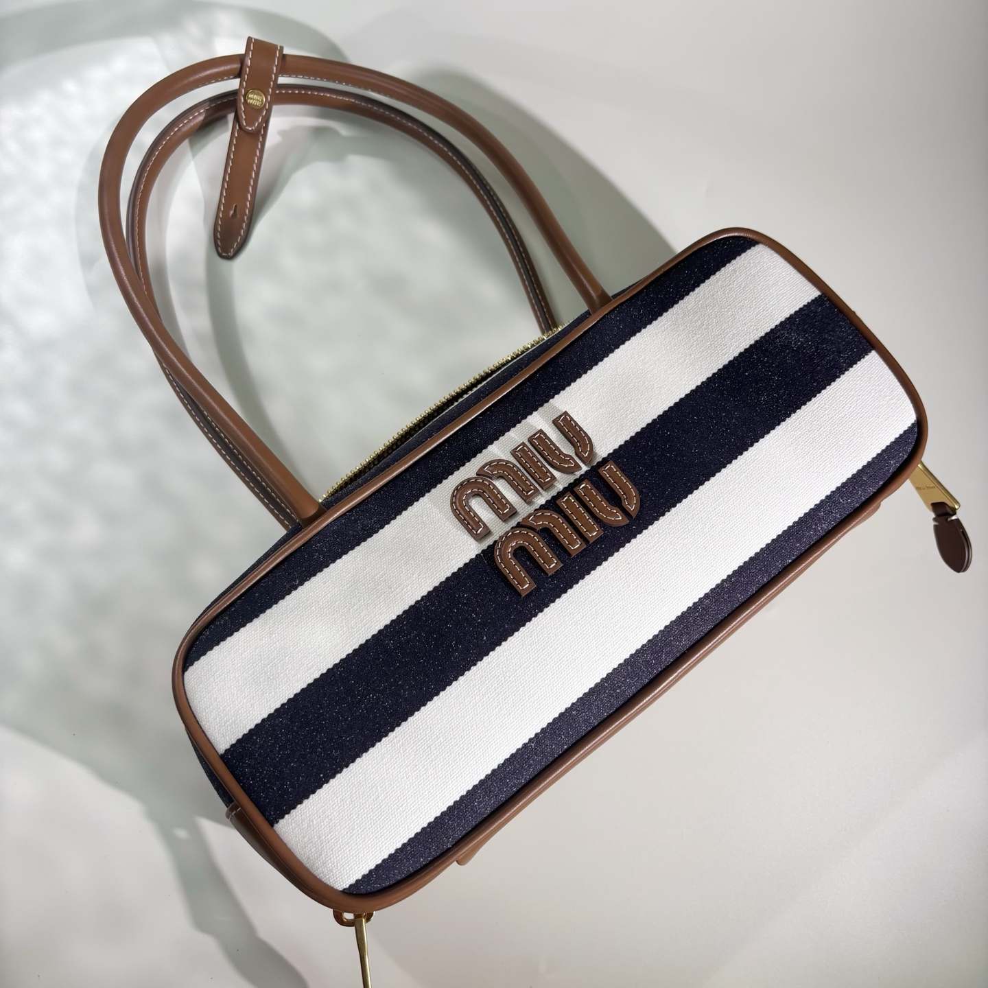 미우미우 캔버스 및 가죽 보우 백